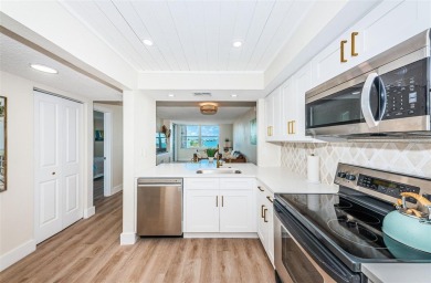 Stunning Condo @ Isla Del Sol with Dual-Purpose Investment: Your on Isla Del Sol Yacht and Country Club in Florida - for sale on GolfHomes.com, golf home, golf lot