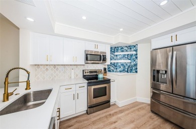 Stunning Condo @ Isla Del Sol with Dual-Purpose Investment: Your on Isla Del Sol Yacht and Country Club in Florida - for sale on GolfHomes.com, golf home, golf lot