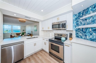 Stunning Condo @ Isla Del Sol with Dual-Purpose Investment: Your on Isla Del Sol Yacht and Country Club in Florida - for sale on GolfHomes.com, golf home, golf lot
