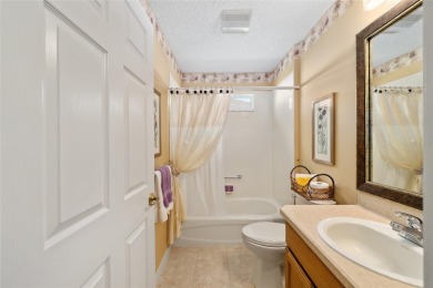 BOND PAID!! WELCOME TO THIS DESIGNER CYPRESS MODEL HOME IN THE on The Links of Spruce Creek in Florida - for sale on GolfHomes.com, golf home, golf lot