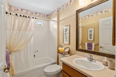 BOND PAID!! WELCOME TO THIS DESIGNER CYPRESS MODEL HOME IN THE on The Links of Spruce Creek in Florida - for sale on GolfHomes.com, golf home, golf lot