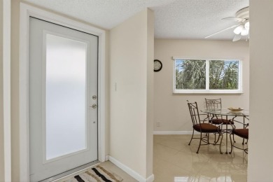 BRIGHT AND AIRY, EXTRA LARGE 1346 SQ/FT RENOVATED CORNER on Wynmoor Golf Course in Florida - for sale on GolfHomes.com, golf home, golf lot