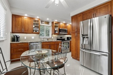 BRIGHT AND AIRY, EXTRA LARGE 1346 SQ/FT RENOVATED CORNER on Wynmoor Golf Course in Florida - for sale on GolfHomes.com, golf home, golf lot