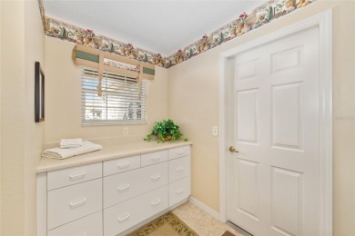 BOND PAID!! WELCOME TO THIS DESIGNER CYPRESS MODEL HOME IN THE on The Links of Spruce Creek in Florida - for sale on GolfHomes.com, golf home, golf lot