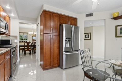 BRIGHT AND AIRY, EXTRA LARGE 1346 SQ/FT RENOVATED CORNER on Wynmoor Golf Course in Florida - for sale on GolfHomes.com, golf home, golf lot