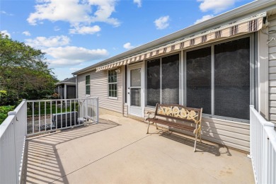 BOND PAID!! WELCOME TO THIS DESIGNER CYPRESS MODEL HOME IN THE on The Links of Spruce Creek in Florida - for sale on GolfHomes.com, golf home, golf lot