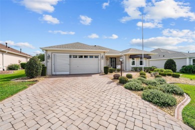 BOND PAID!! WELCOME TO THIS DESIGNER CYPRESS MODEL HOME IN THE on The Links of Spruce Creek in Florida - for sale on GolfHomes.com, golf home, golf lot