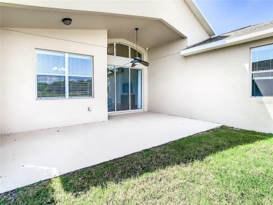 Prime Location! LOW HOA FEES AND NO CDD FEES This exquisite on Meadow Oaks Golf and Country Club in Florida - for sale on GolfHomes.com, golf home, golf lot
