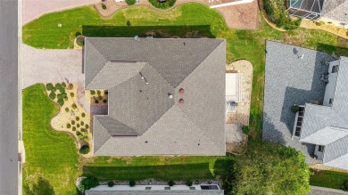 BOND PAID!! WELCOME TO THIS DESIGNER CYPRESS MODEL HOME IN THE on The Links of Spruce Creek in Florida - for sale on GolfHomes.com, golf home, golf lot