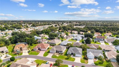 BOND PAID!! WELCOME TO THIS DESIGNER CYPRESS MODEL HOME IN THE on The Links of Spruce Creek in Florida - for sale on GolfHomes.com, golf home, golf lot