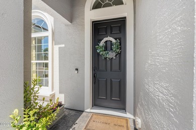 Welcome to 352 Stirling Bridge Drive, an exceptional residence on Plantation Bay Golf and Country Club in Florida - for sale on GolfHomes.com, golf home, golf lot