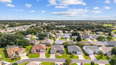 BOND PAID!! WELCOME TO THIS DESIGNER CYPRESS MODEL HOME IN THE on The Links of Spruce Creek in Florida - for sale on GolfHomes.com, golf home, golf lot