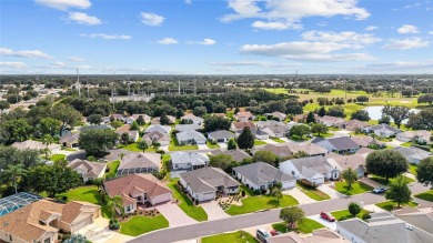 BOND PAID!! WELCOME TO THIS DESIGNER CYPRESS MODEL HOME IN THE on The Links of Spruce Creek in Florida - for sale on GolfHomes.com, golf home, golf lot