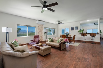 With sweeping 180-degree ocean views and a backdrop of 5 on Waikoloa Village Golf Club in Hawaii - for sale on GolfHomes.com, golf home, golf lot