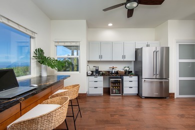 With sweeping 180-degree ocean views and a backdrop of 5 on Waikoloa Village Golf Club in Hawaii - for sale on GolfHomes.com, golf home, golf lot