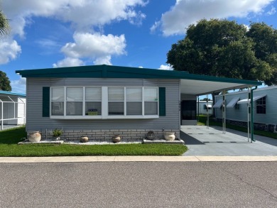 Large, well-tended, freshly painted home in desirable on East Bay Golf Club in Florida - for sale on GolfHomes.com, golf home, golf lot