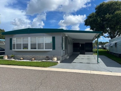 Large, well-tended, freshly painted home in desirable on East Bay Golf Club in Florida - for sale on GolfHomes.com, golf home, golf lot