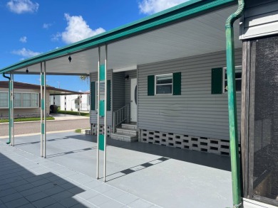 Large, well-tended, freshly painted home in desirable on East Bay Golf Club in Florida - for sale on GolfHomes.com, golf home, golf lot