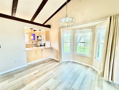 Welcome to this inviting home in Fairway Villas, offering 2 on Sabal Trace Golf and Country Club in Florida - for sale on GolfHomes.com, golf home, golf lot