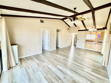 Welcome to this inviting home in Fairway Villas, offering 2 on Sabal Trace Golf and Country Club in Florida - for sale on GolfHomes.com, golf home, golf lot