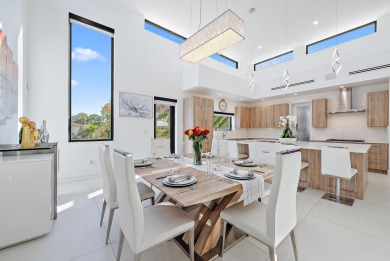 Welcome to a beautiful, newly built, modern home on one of Lake on Lake Worth Municipal Golf Course in Florida - for sale on GolfHomes.com, golf home, golf lot
