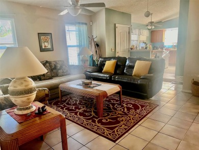 House with a lake in the backyard in a prime location right in on Mayfair Country Club in Florida - for sale on GolfHomes.com, golf home, golf lot