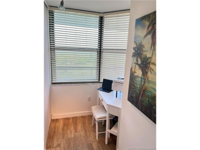 Welcome to your coastal retreat! This beautifully furnished on Island Dunes Country Club in Florida - for sale on GolfHomes.com, golf home, golf lot