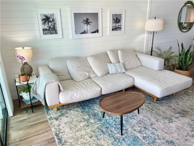 Welcome to your coastal retreat! This beautifully furnished on Island Dunes Country Club in Florida - for sale on GolfHomes.com, golf home, golf lot