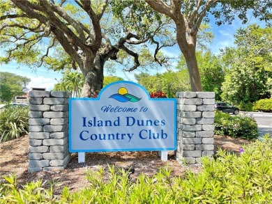 Welcome to your coastal retreat! This beautifully furnished on Island Dunes Country Club in Florida - for sale on GolfHomes.com, golf home, golf lot