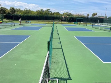 Welcome to your coastal retreat! This beautifully furnished on Island Dunes Country Club in Florida - for sale on GolfHomes.com, golf home, golf lot