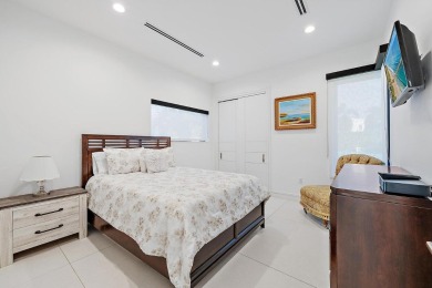 Welcome to a beautiful, newly built, modern home on one of Lake on Lake Worth Municipal Golf Course in Florida - for sale on GolfHomes.com, golf home, golf lot