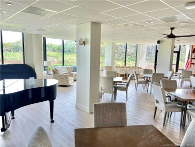 Welcome to your coastal retreat! This beautifully furnished on Island Dunes Country Club in Florida - for sale on GolfHomes.com, golf home, golf lot