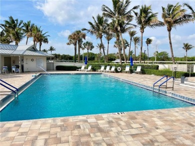 Welcome to your coastal retreat! This beautifully furnished on Island Dunes Country Club in Florida - for sale on GolfHomes.com, golf home, golf lot