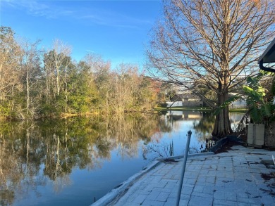 House with a lake in the backyard in a prime location right in on Mayfair Country Club in Florida - for sale on GolfHomes.com, golf home, golf lot
