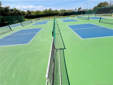 Welcome to your coastal retreat! This beautifully furnished on Island Dunes Country Club in Florida - for sale on GolfHomes.com, golf home, golf lot
