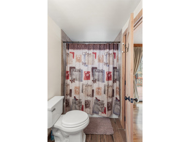 Enjoy a private 0.75-acre setting with the year-round sounds of on Sapphire National Golf Club in North Carolina - for sale on GolfHomes.com, golf home, golf lot