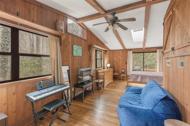 Enjoy a private 0.75-acre setting with the year-round sounds of on Sapphire National Golf Club in North Carolina - for sale on GolfHomes.com, golf home, golf lot