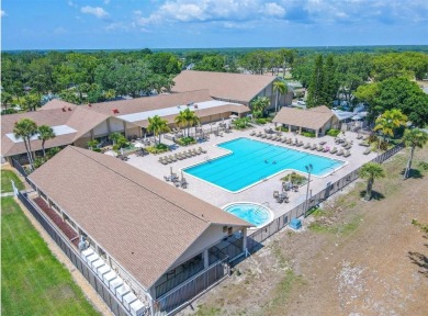 Welcome home to the sought-after neighborhood of Highland Lakes on Highland Lakes Executive Golf Course in Florida - for sale on GolfHomes.com, golf home, golf lot