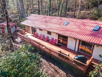 Enjoy a private 0.75-acre setting with the year-round sounds of on Sapphire National Golf Club in North Carolina - for sale on GolfHomes.com, golf home, golf lot