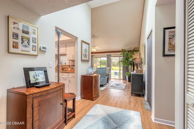 Located in the highly sought-after Sugar Mill Country Club on Sugar Mill Country Club in Florida - for sale on GolfHomes.com, golf home, golf lot