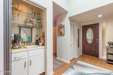 Located in the highly sought-after Sugar Mill Country Club on Sugar Mill Country Club in Florida - for sale on GolfHomes.com, golf home, golf lot