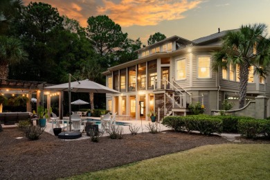 As you step into this elegant home, you'll be greeted by a on Dunes West Golf Club in South Carolina - for sale on GolfHomes.com, golf home, golf lot