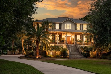 As you step into this elegant home, you'll be greeted by a on Dunes West Golf Club in South Carolina - for sale on GolfHomes.com, golf home, golf lot