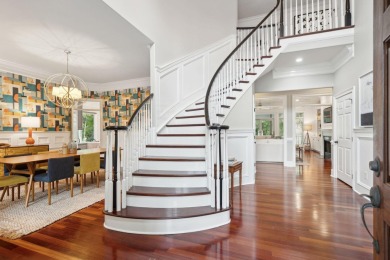 As you step into this elegant home, you'll be greeted by a on Dunes West Golf Club in South Carolina - for sale on GolfHomes.com, golf home, golf lot