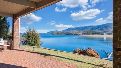 Million-dollar lake and mountain views define this on Waters Edge Country Club in Virginia - for sale on GolfHomes.com, golf home, golf lot