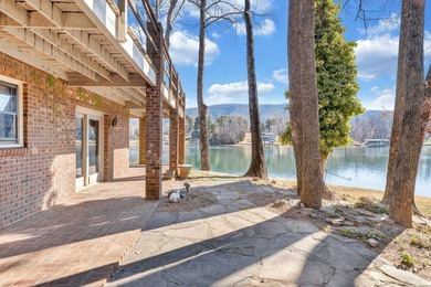 Million-dollar lake and mountain views define this on Waters Edge Country Club in Virginia - for sale on GolfHomes.com, golf home, golf lot