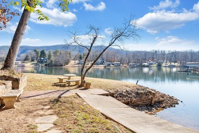 Million-dollar lake and mountain views define this on Waters Edge Country Club in Virginia - for sale on GolfHomes.com, golf home, golf lot