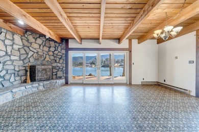 Million-dollar lake and mountain views define this on Waters Edge Country Club in Virginia - for sale on GolfHomes.com, golf home, golf lot