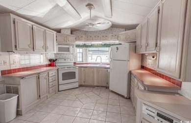 **Coastal Charm & Resort Living in North Myrtle Beach!** on Tidewater Golf Club and Plantation in South Carolina - for sale on GolfHomes.com, golf home, golf lot