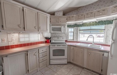 **Coastal Charm & Resort Living in North Myrtle Beach!** on Tidewater Golf Club and Plantation in South Carolina - for sale on GolfHomes.com, golf home, golf lot